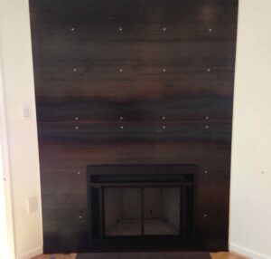 Blackened steel fireplace with a stylish surround in Washington, DC