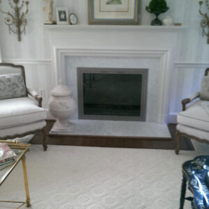 Aesthetic old style firepit with beautiful big vase beside it.