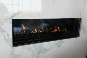 Modern burning fireplace with a sleek design and bright flames in Washington, DC