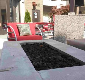 Outdoor firepit with flame by Bell Partners in Washington, DC