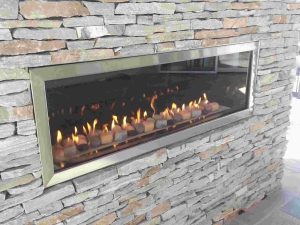 Large scaled outdoor gas fireplace with flames in Washington, DC